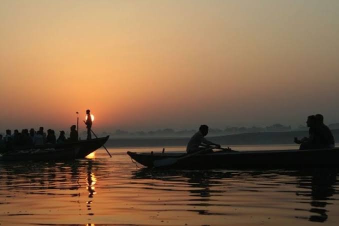 Boats gathered on the river for the Ganga Aarti at Dashashwamedh Ghat, Varanasi